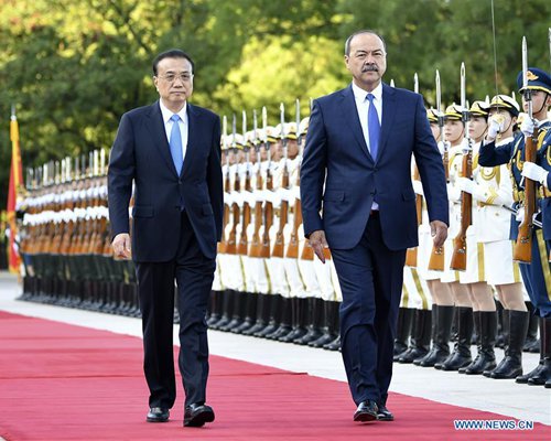 Chinese premier holds talks with Uzbek PM to boost ties