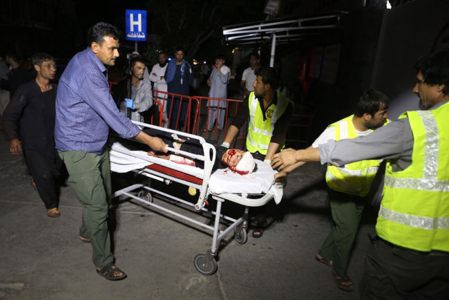 Afghan official: Suicide attack in wedding hall kills 63