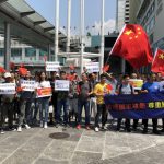 Hong Kong residents gather to express reverence to Chinese national emblem, flag