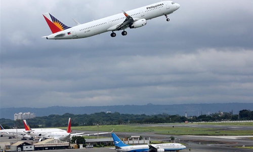 Philippines to shut down all airports in Luzon starting Friday to curb COVID-19 spread