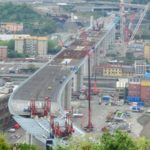 Final span of new Genoa bridge raised in presence of Italian PM