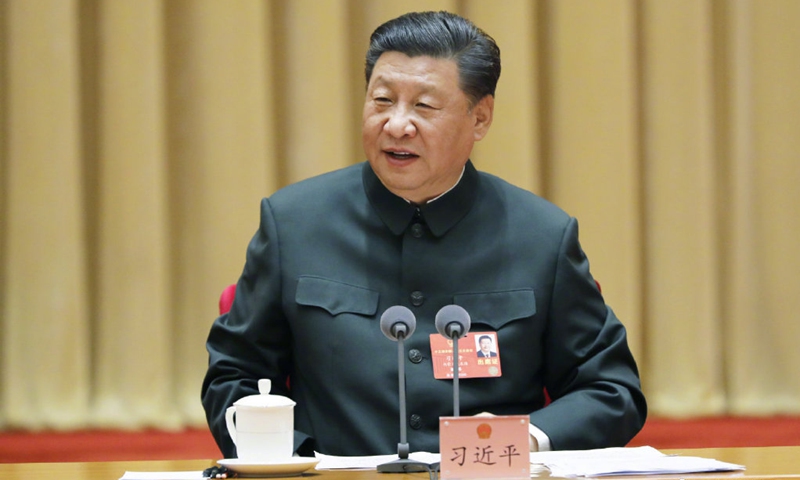 Xi stresses strengthening national defense, armed forces