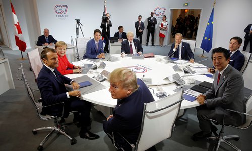 Trump says he will delay G7 summit