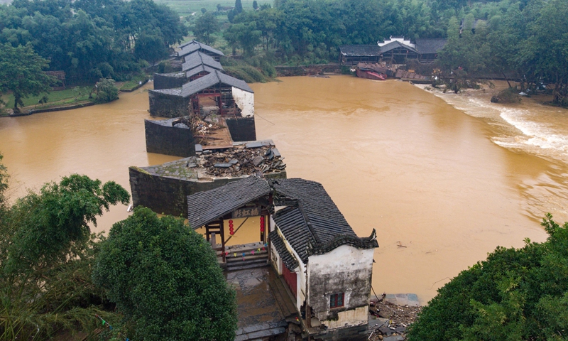 Chinese relics authorities call for urgent efforts to protect flood-battered artifacts