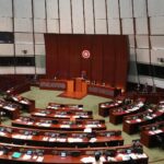 Eight HK lawmakers charged with contempt, interfering with legislative meeting