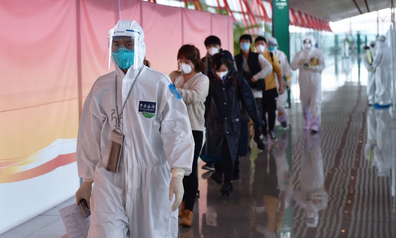 Beijing imposes ‘14+7+7’ policy on overseas arrivals, extending quarantine period