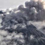 Indonesia’s most active volcano emits hot clouds