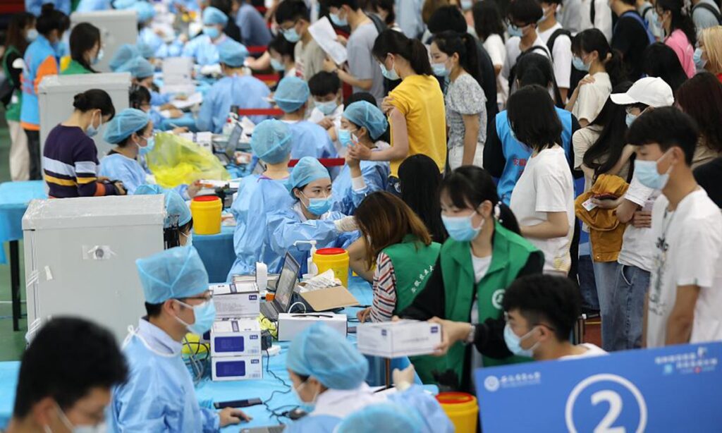 Chinese people rush to get vaccinated after sporadic domestic cases reported in Anhui and Liaoning