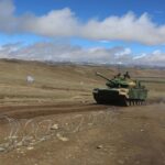 Tank repair vehicle developed from Type 15 light tank makes plateau debut