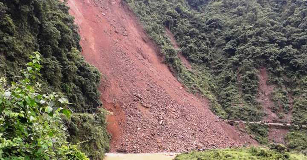 A dozer digging a road in Dhading was hit by a landslide, leaving three missing