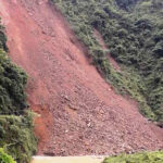 A dozer digging a road in Dhading was hit by a landslide, leaving three missing