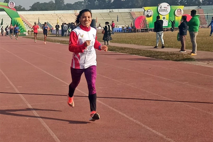 Pushpa of Nepal won bronze medal in Dhaka Marathon