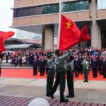 Schools in HK host national flag-raising ceremony on New Year’s Day to enhance national identity, patriotism