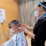 ‘This experience is priceless to me’: exploring the story of a barber at Beijing 2022