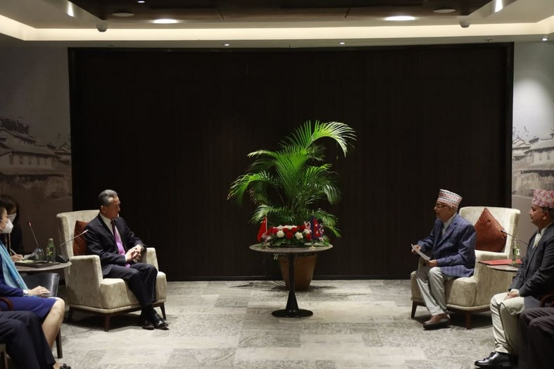 Chinese Foreign Minister Wang holds meeting with UML Chairman Oli