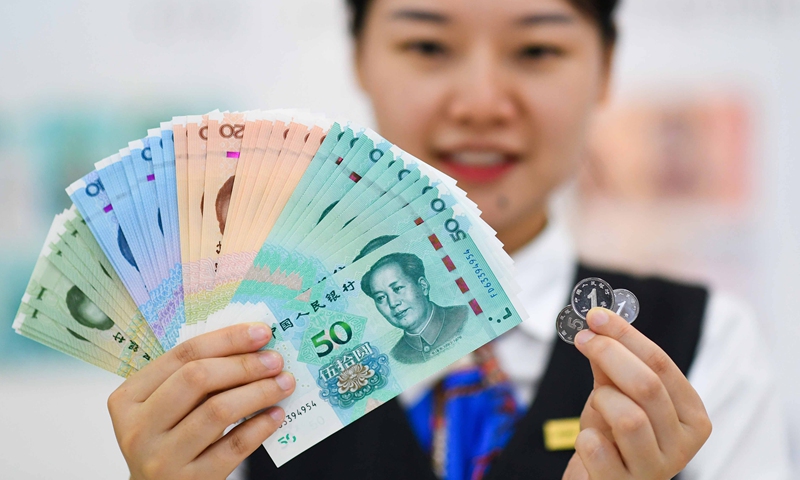 Chinese yuan weakens to around 6.45 per dollar, but long-term prospect is stable: analyst