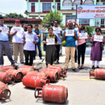 Demonstration in front of the Chief Minister's Office against the price hike by placing empty cylinders