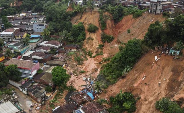 In Brazil, the death toll from floods and landslides has grown to 56.