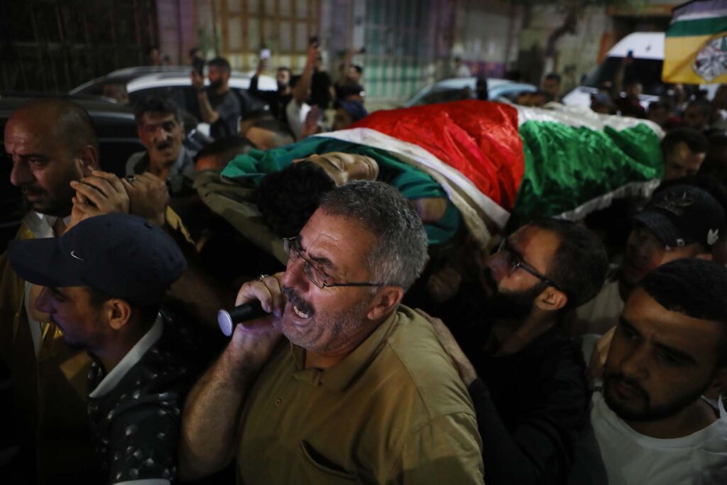 MIDEAST-HEBRON-PALESTINIAN-FUNERAL