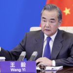 China, Japan are partners, pose no threat to each other: Wang Yi