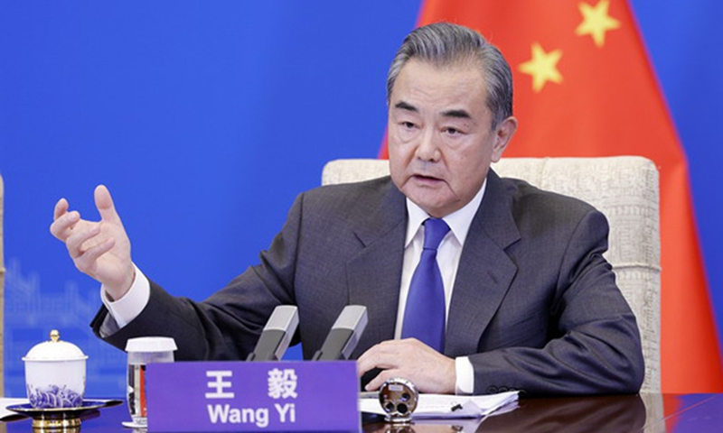 China, Japan are partners, pose no threat to each other: Wang Yi