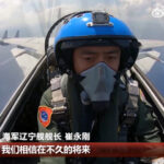 Chinese state media reveals carrier-based J-15 fighter flyover of suspected foreign warship