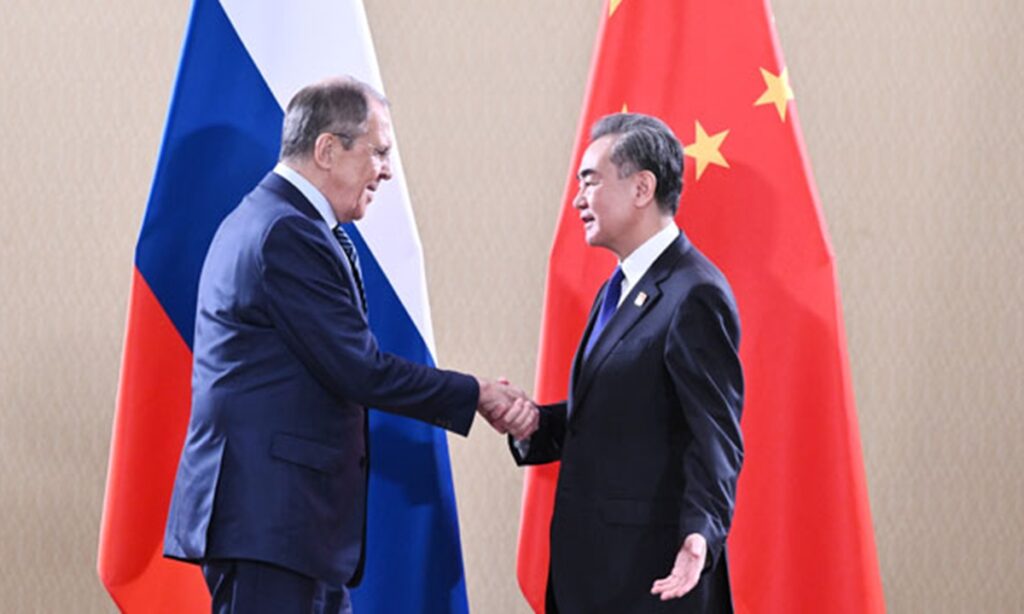 Wang Yi highlights cooperation with Lavrov, mediating on nuclear threat management as the West isolates Moscow