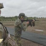 Chinese, Lao troops exchange weapons in live-fire joint drills, displaying trust