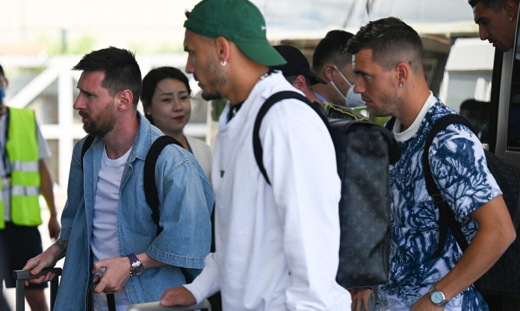 ‘We are so excited to breathing the same air as Messi!’ Hundreds of Messi fans seen waiting at the team hotel as the football star arrives in Beijing