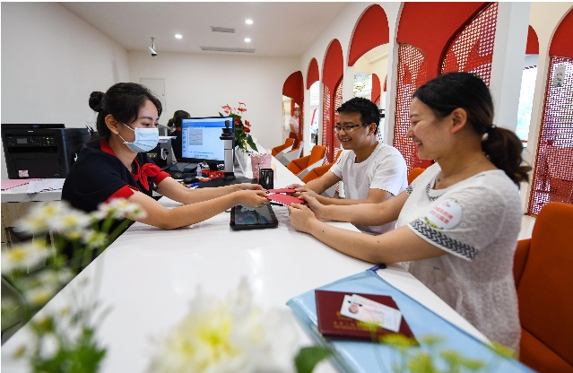 Young couples in China embrace retro-romance by publishing marriage announcements in newspapers