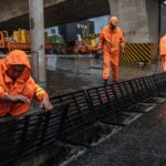 Beijing soaked in heaviest rainfall in decade, on highest alert