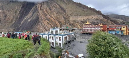 Mustang floods sweep away 10 houses, police post and bridge