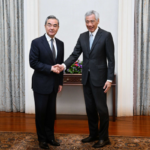 China eyes shared interests with Singapore, opposes hegemony, protectionism