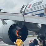 Nine passengers suffer minor injuries during evacuation of Air China Flight CA403 amidst fire and smoke