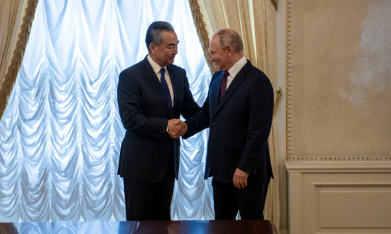 Top diplomat Wang Yi wraps up Russia visit after meeting with Putin