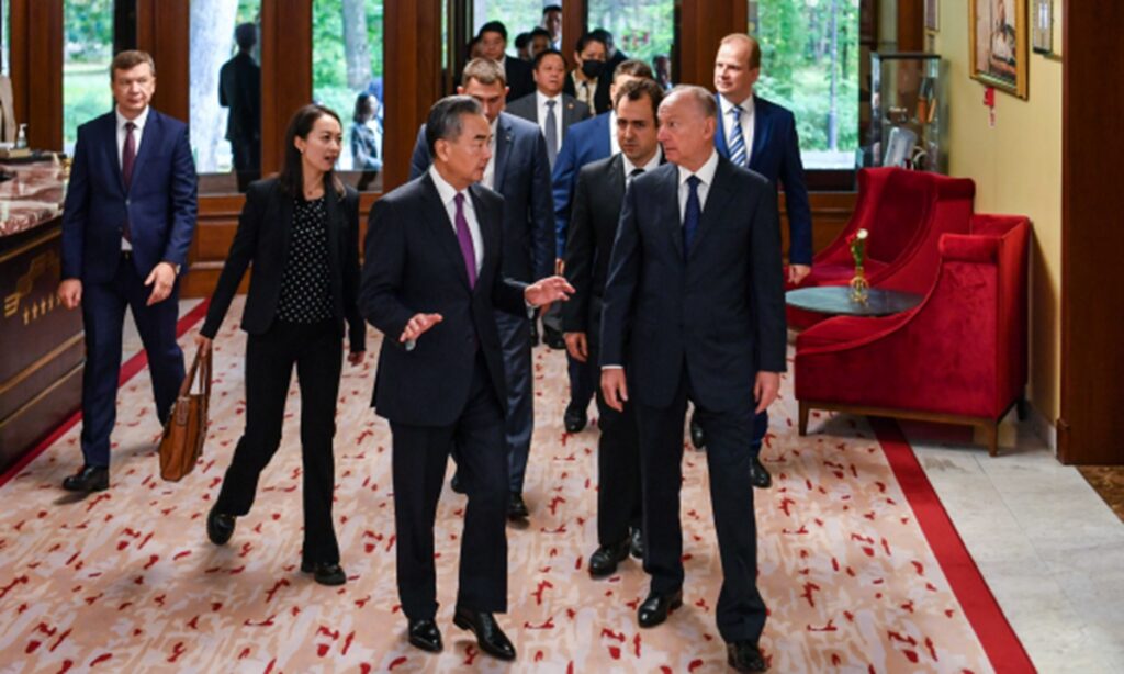 Wang Yi, Patrushev hold strategic security talks as two countries to make global governance more just and equitable