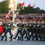 Over 300,000 witness flag-raising at Tian’anmen Square on National Day, ‘a unique romance belonging to Chinese’