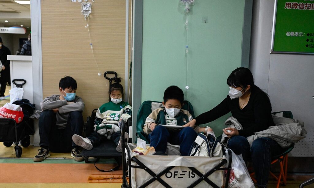 Hospitals across China grapple with respiratory illnesses surge