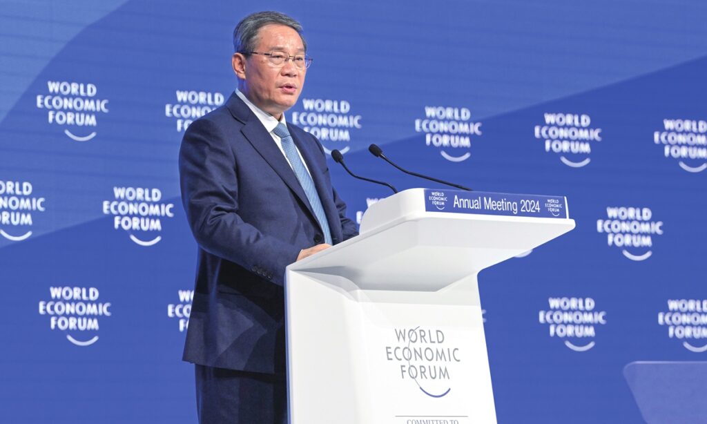 Li urges global cooperation, vows continued opening-up at WEF