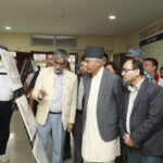 Former PM Deuba visits RSS photo exhibition