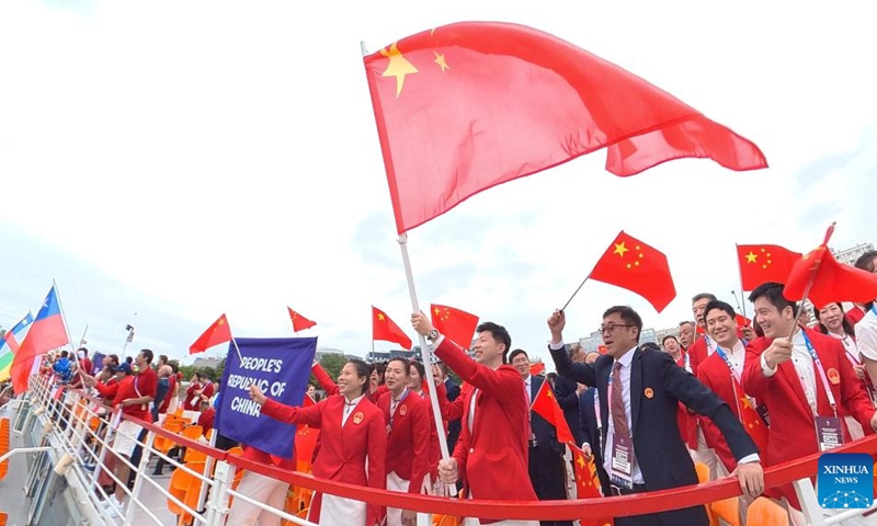 Team China showcases confidence, friendship, unity at Paris Olympics