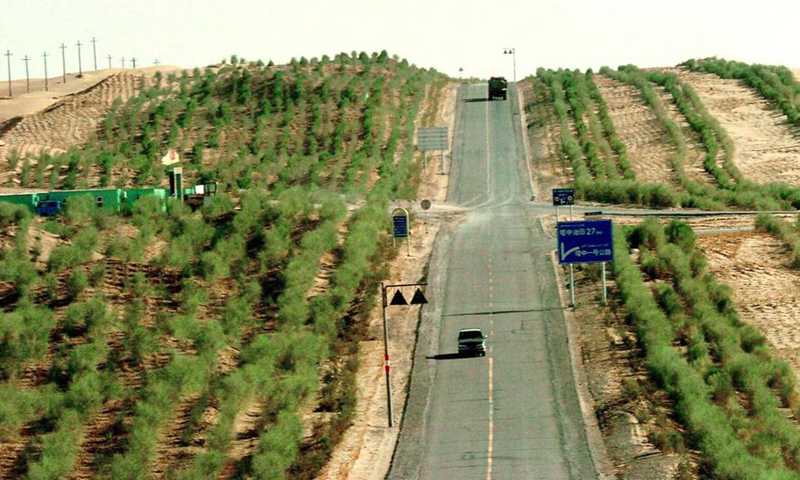 Robots, plants and photovoltaic panels — China fortifies ‘green Great Wall’ to contain desert